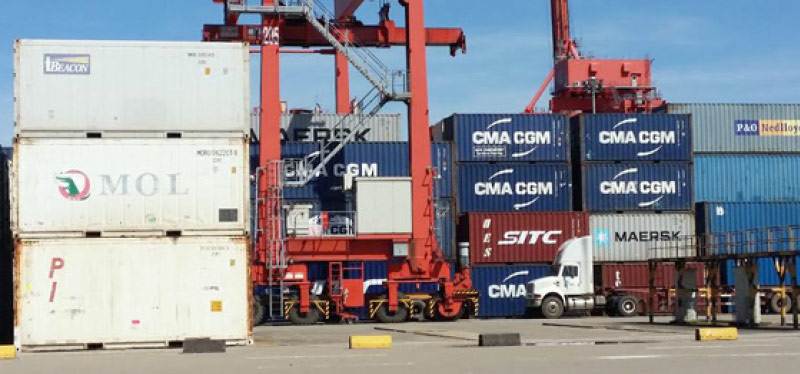 Containers prepared for loading at a Cambodian port